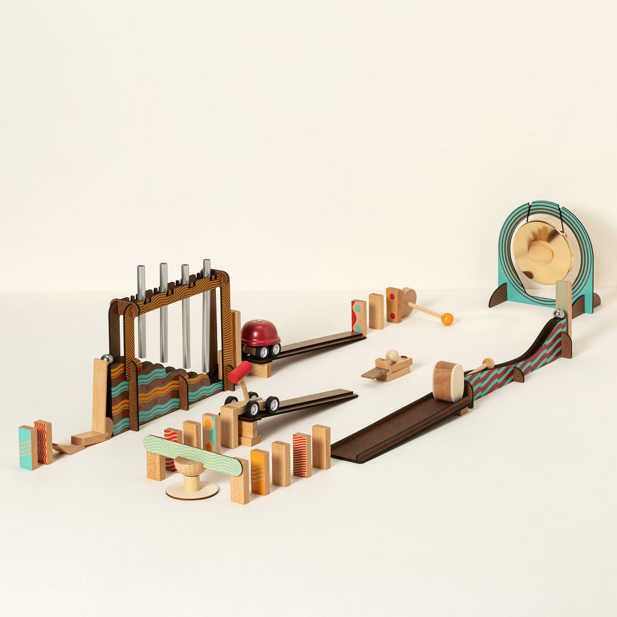 Wooden toy set with various mechanical components on a light background