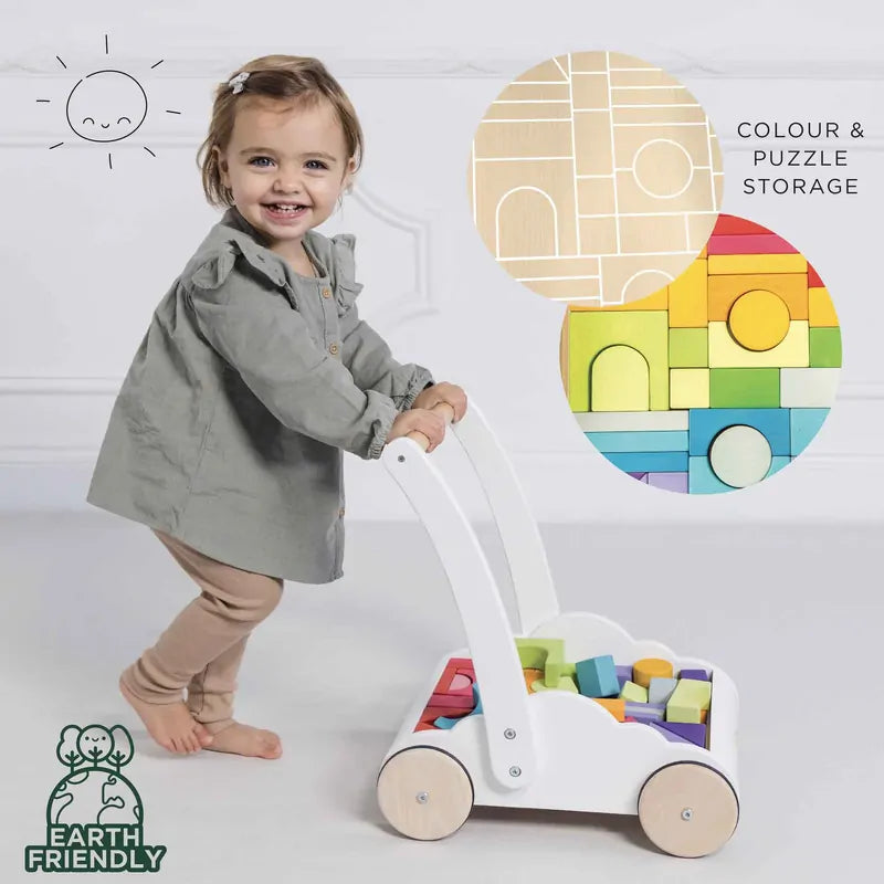 Child pushing a toy with colorful blocks and a puzzle, Earth Friendly logo visible