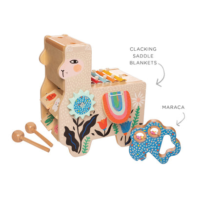 Wooden toy llama with accessories on a white background