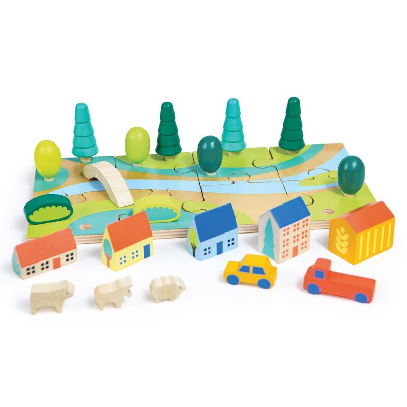 Wooden toy set with houses, cars, animals, and a landscape on a white background