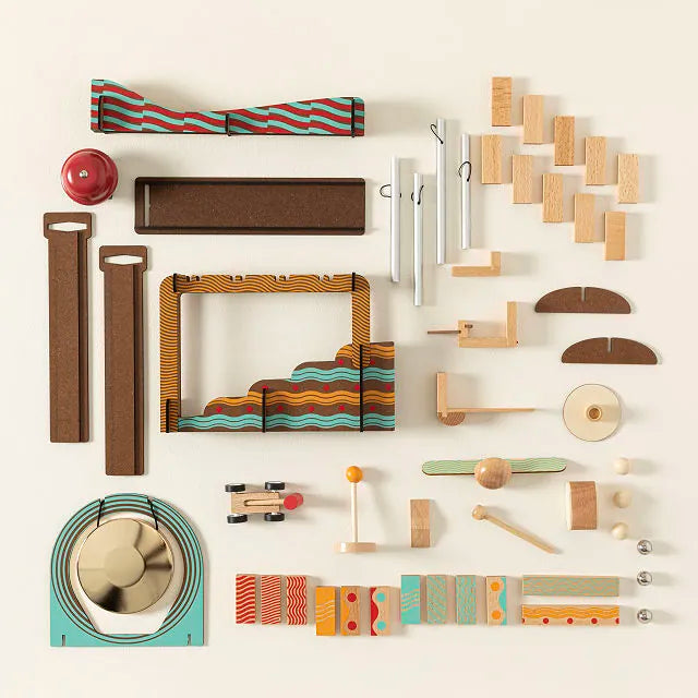 Collection of wooden toys and tools on a white background