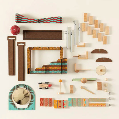 Collection of wooden toys and tools on a white background