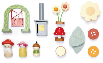 Collection of colorful wooden toys including a green arch, small figures, flowers, and buttons on a white background.