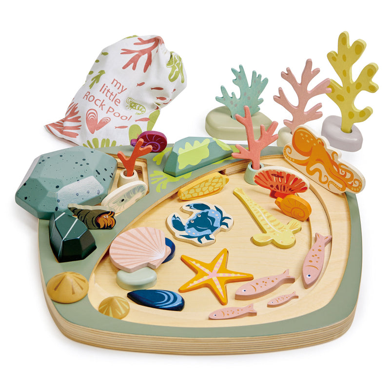 Wooden ocean-themed puzzle with colorful sea creatures and coral on a white background